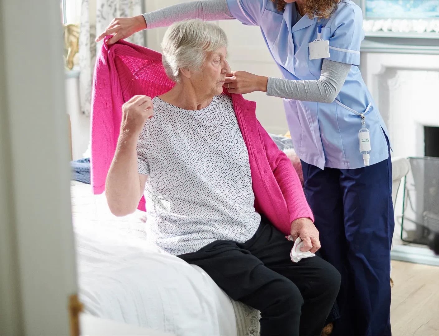 Caregiver providing compassionate support to senior at home