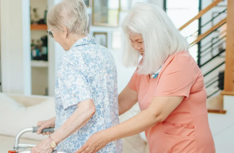 Caregiver providing comprehensive in-home care to senior